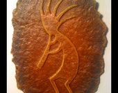Kokopelli - acrylic painted, cast sculptural relief wall hanging