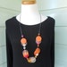 Resin bead double layer necklace in Hot Pink, Orange and Frost White coins