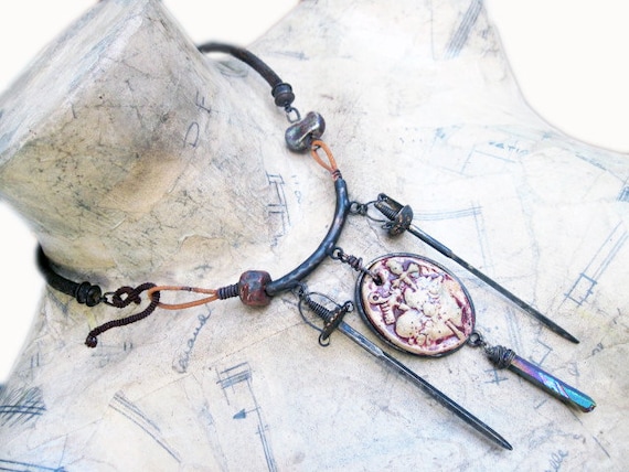 The Shiva Hypothesis. Rustic Choker Dark heart swords vintage antique recycled with raku ceramics.