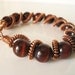 Copper coiled wire spiral red tiger eye bracelet on Etsy