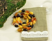 Baltic Amber Baby teething necklace MIX colors, polished, olive beads in Lovely Linen gift bag