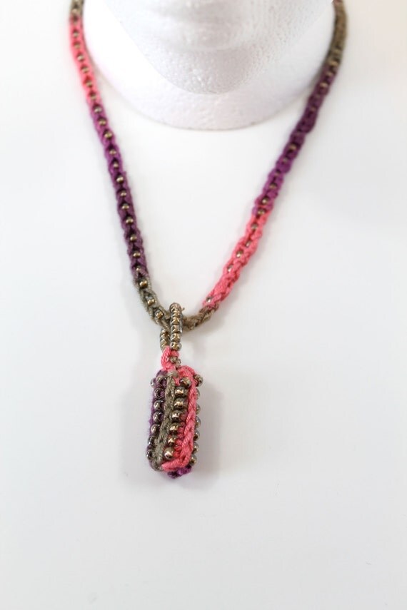 Knit sugar cane beaded necklace with gold-lined beaded crochet pendant.  Charity: Girls' education