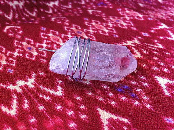 anu. large wire-wrapped tibetan quartz point necklace.