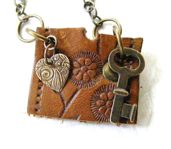 Upcycled Leather Pendant with Brass Charms on by meiguidesigns