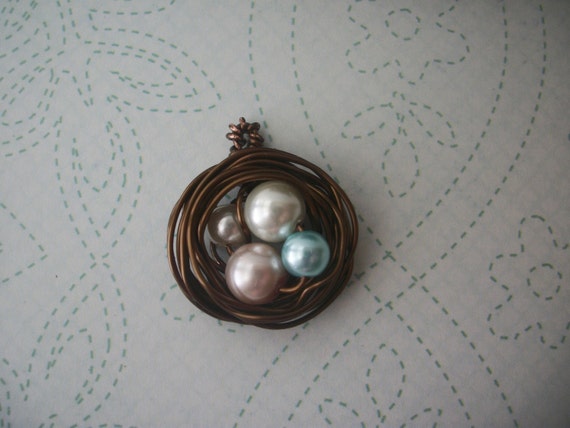 Antiqued brass bird's nest pendant (multicolored glass pearls)
